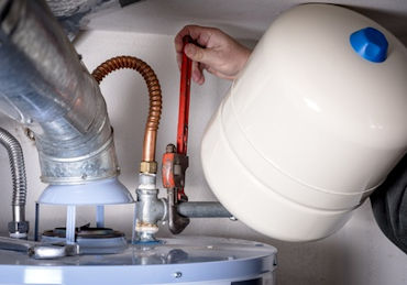 Tomaszek & Sons Plumbing, Heating & Pumps LLC offers water heater maintenance services, water heater repair, and water heater replacement services.